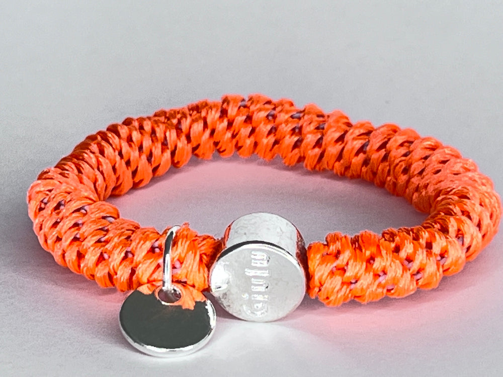 Haargummi mit silber in neon orange